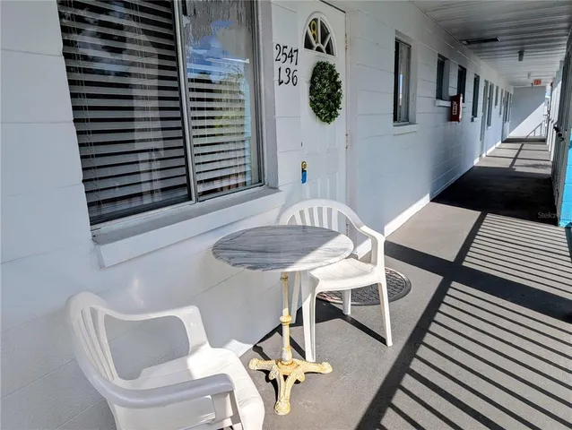 a view of a livingroom with furniture