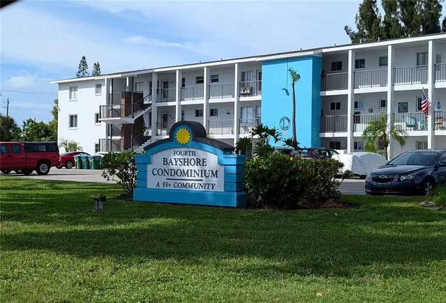 a sign on the side of the house