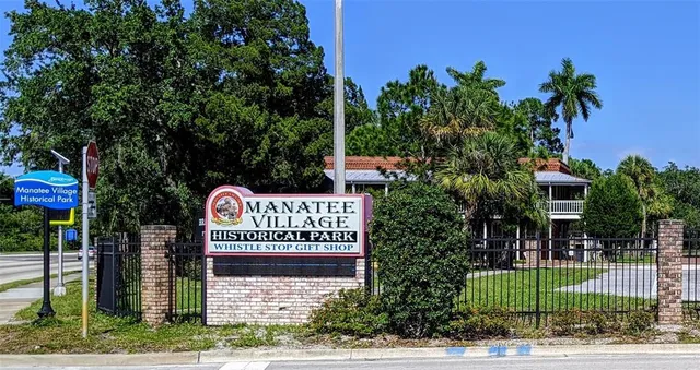 a front view of a house with a garden and plants