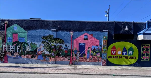 an outdoor space with lots of potted plants