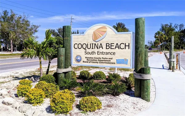 a sign on the side of the road