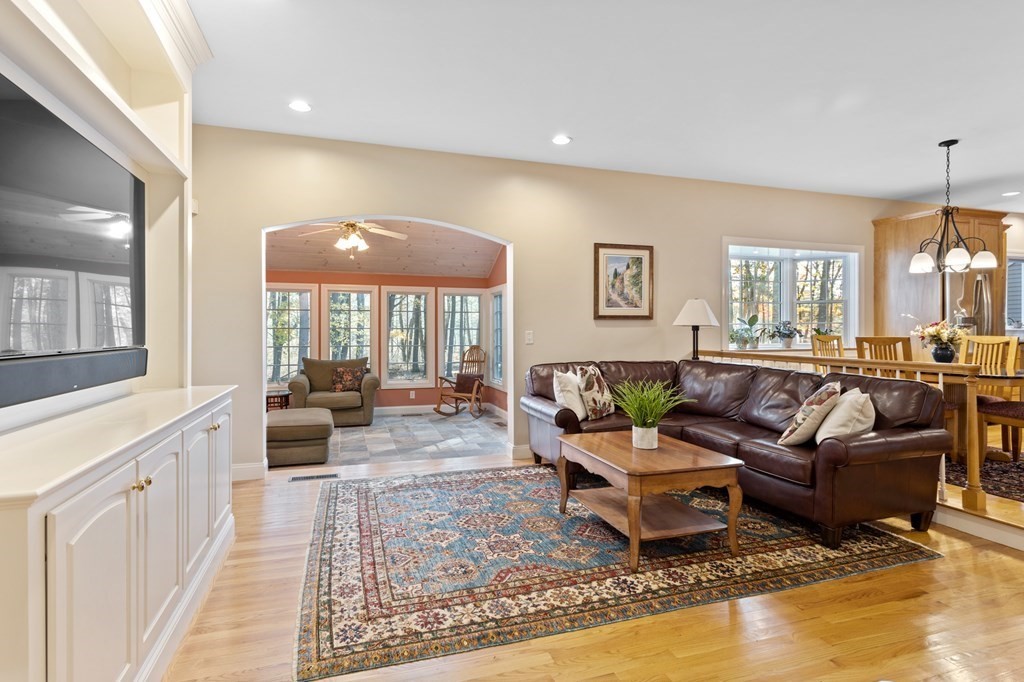 136 Hartwell Road Carlisle, MA 01741 - Photo 16 of 42 a living room with furniture and a large window