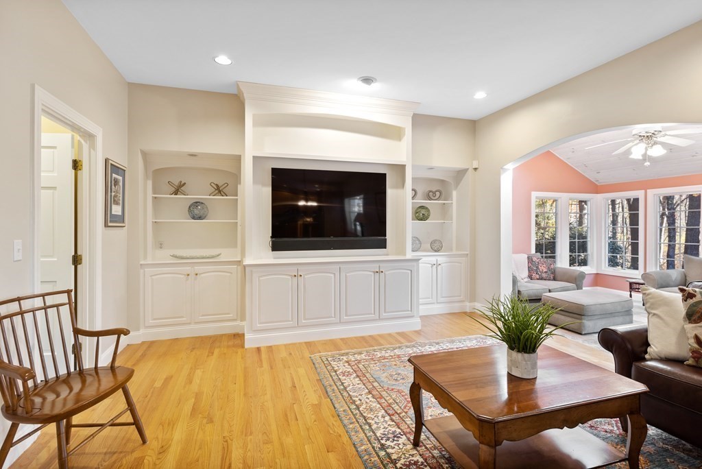 136 Hartwell Road Carlisle, MA 01741 - Photo 17 of 42 a living room with furniture and a flat screen tv