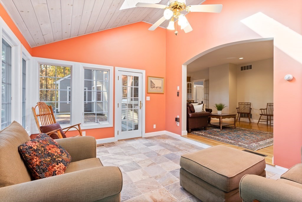 136 Hartwell Road Carlisle, MA 01741 - Photo 19 of 42 a living room with furniture and a large window