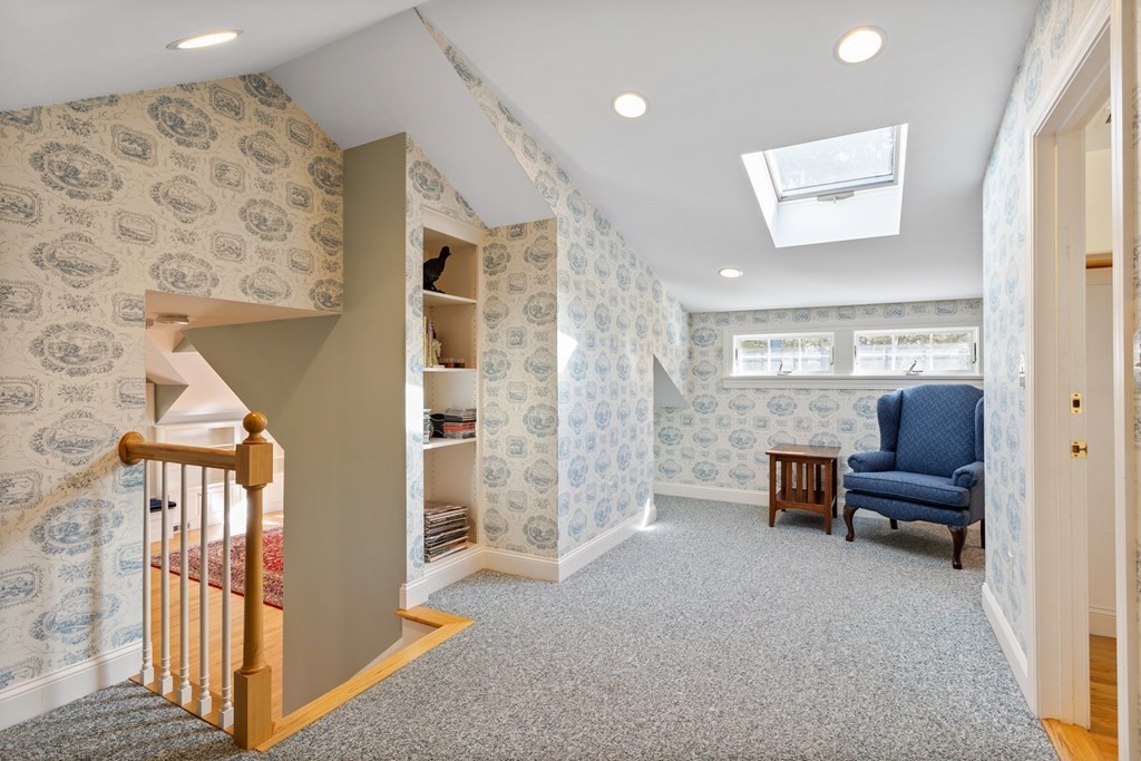 136 Hartwell Road Carlisle, MA 01741 - Photo 23 of 42 a view of livingroom with furniture and windows