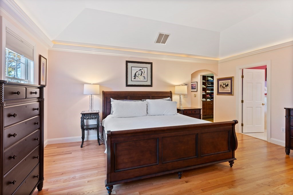 136 Hartwell Road Carlisle, MA 01741 - Photo 25 of 42 a bedroom with a bed and a dresser