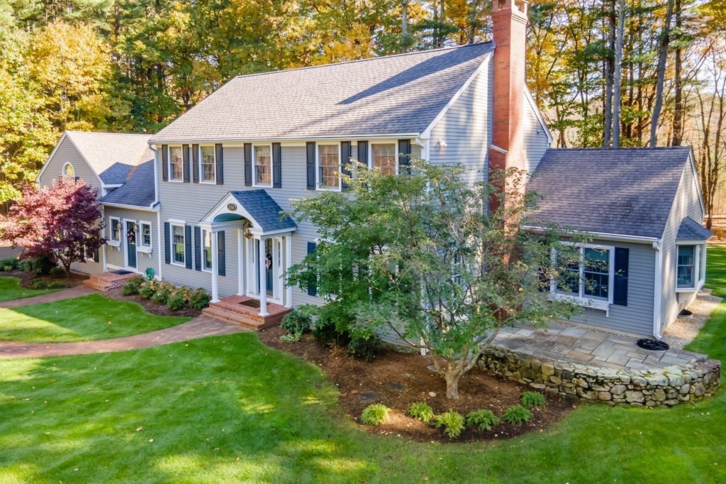 136 Hartwell Road Carlisle, MA 01741 - Photo 3 of 42 front view of a house with a yard