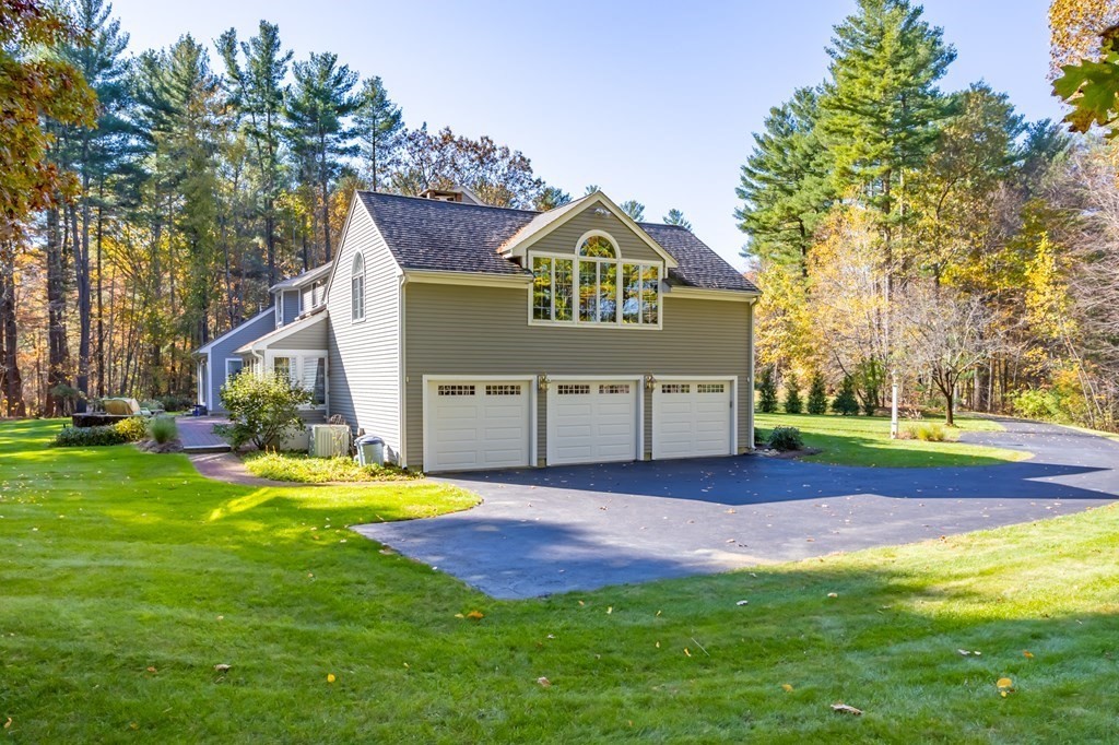 136 Hartwell Road Carlisle, MA 01741 - Photo 40 of 42 a view of a house with a park