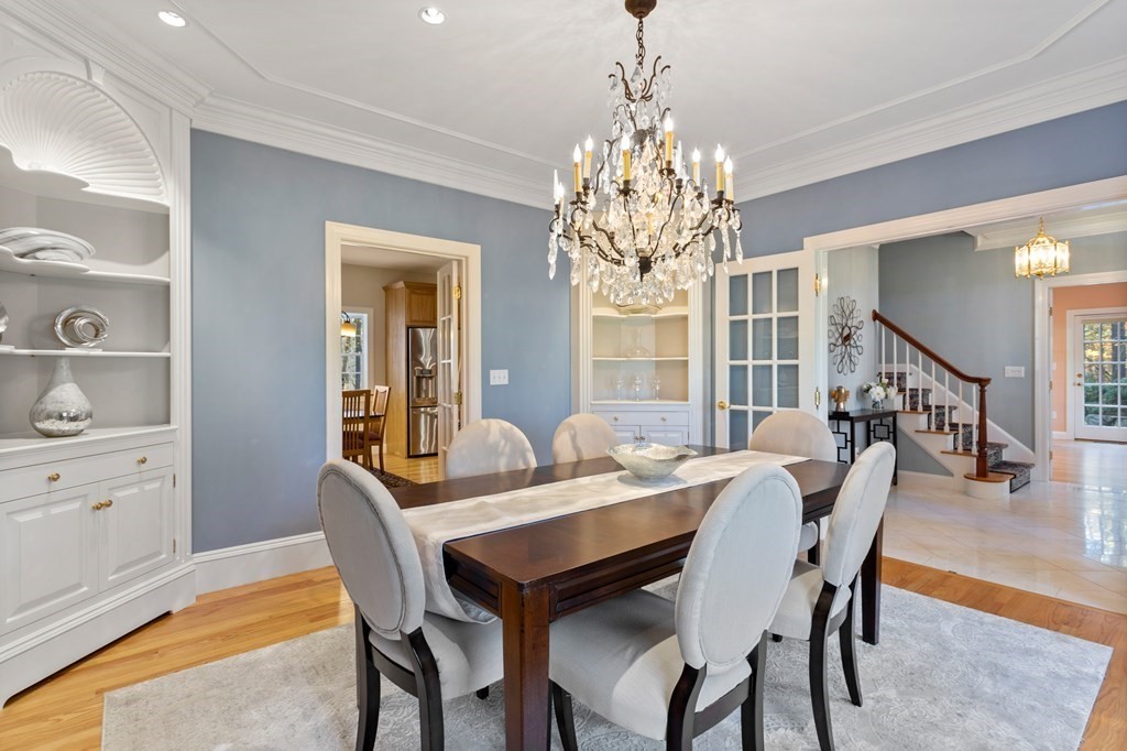136 Hartwell Road Carlisle, MA 01741 - Photo 9 of 42 a view of a dining room with furniture window and wooden floor