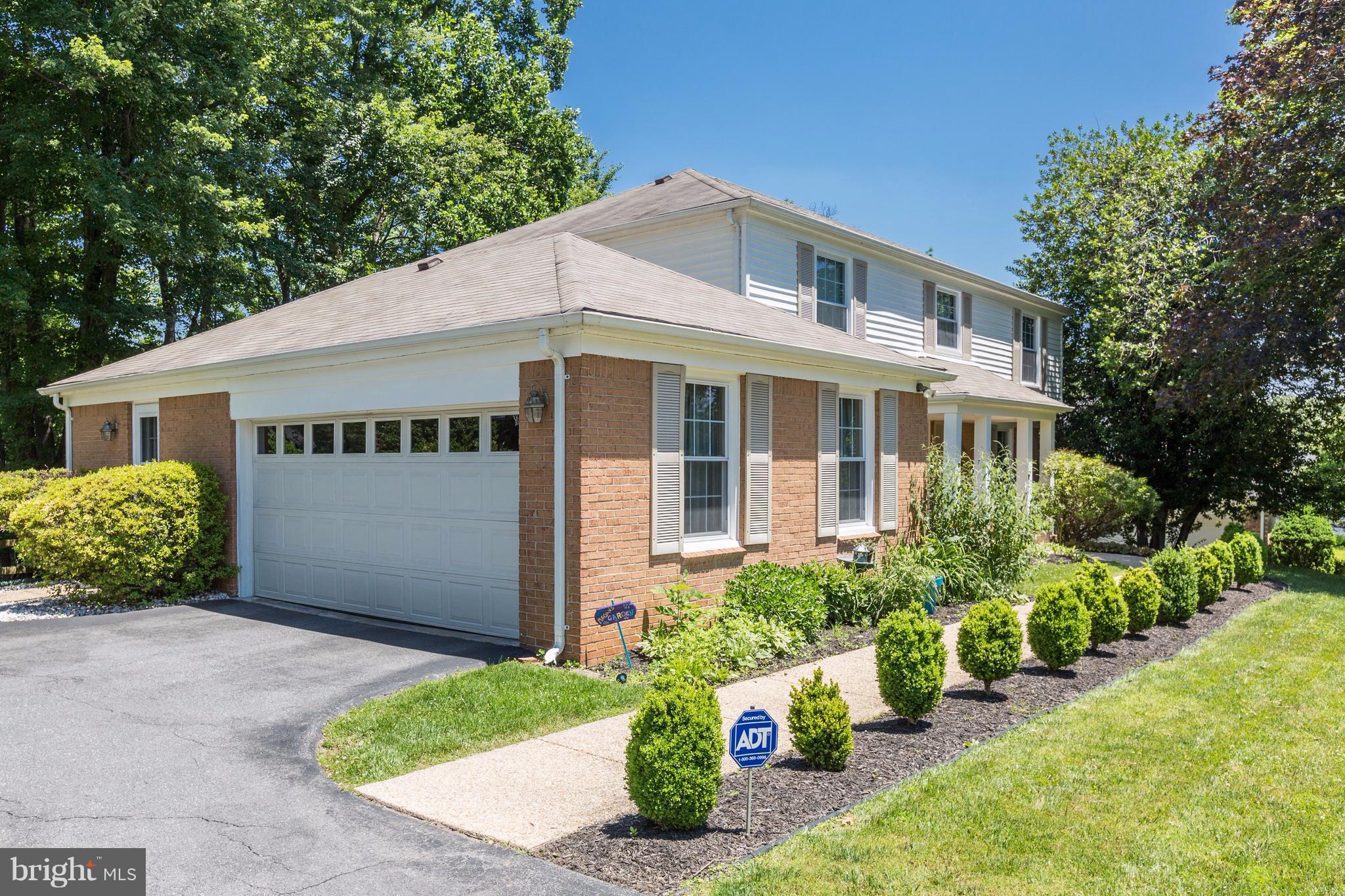 8811 Bells Mill Road Potomac, MD 20854 - Photo 2 of 24 Front with 2 Car Garage