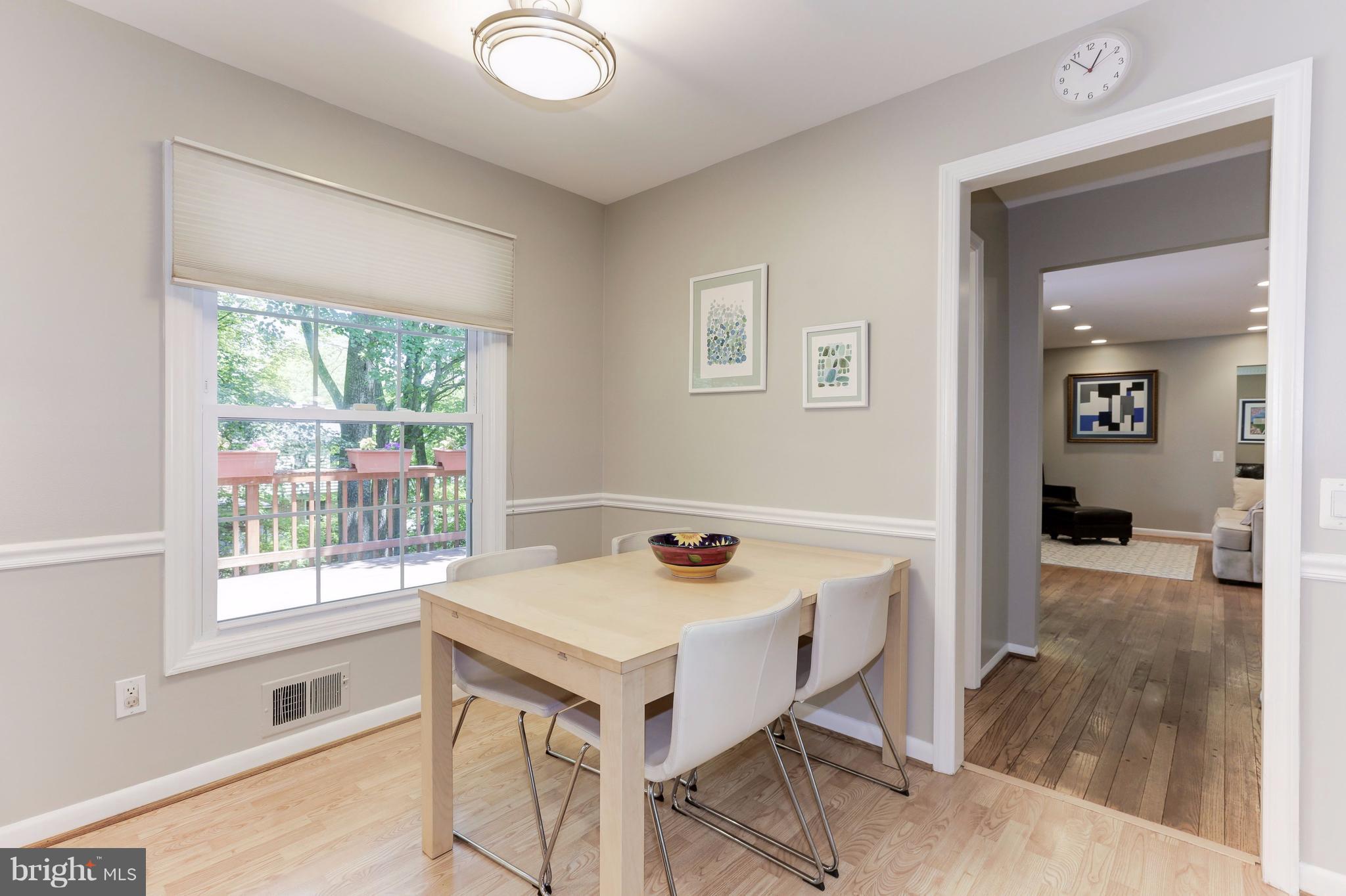 8811 Bells Mill Road Potomac, MD 20854 - Photo 11 of 24 Breakfast Area Open to Kitchen