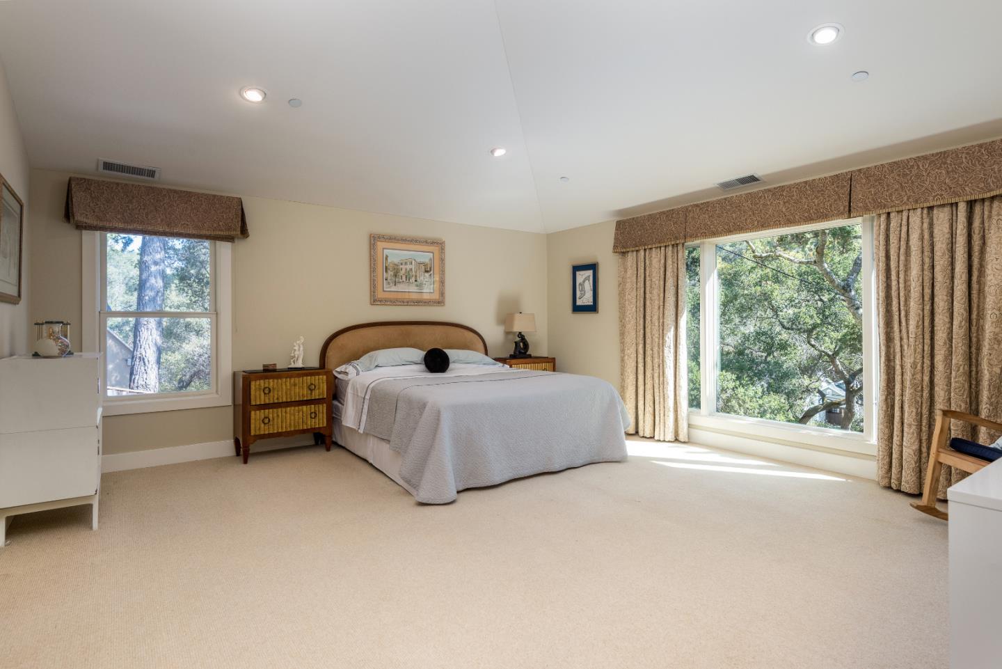 20 Ridgeway Road Hillsborough, CA 94010 - Photo 12 of 31 a spacious bedroom with a bed and a large window