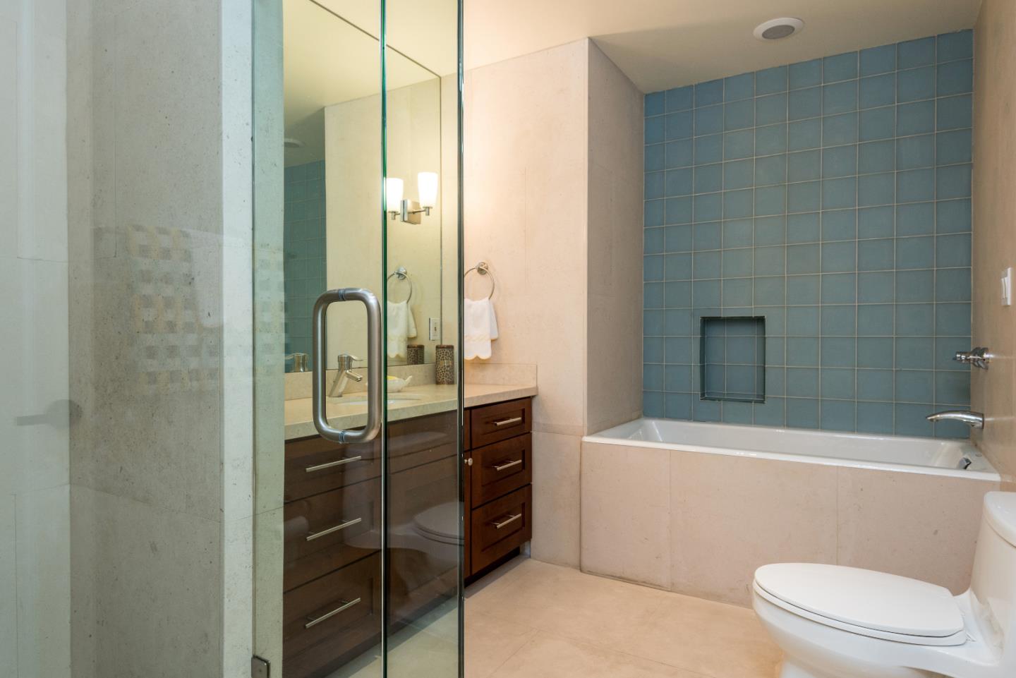 20 Ridgeway Road Hillsborough, CA 94010 - Photo 18 of 31 a bathroom with a toilet a sink and shower