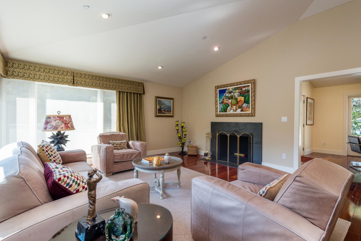 20 Ridgeway Road Hillsborough, CA 94010 - Photo 4 of 31 a living room with furniture and a fireplace
