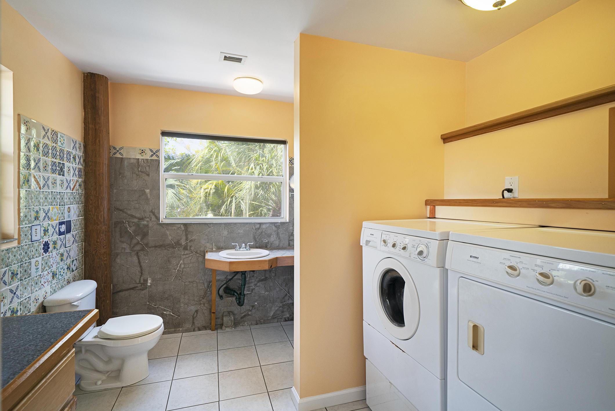 21850 Valencia Road Cudjoe, FL 33042 - Photo 12 of 34 Guest Bathroom Laundry Room