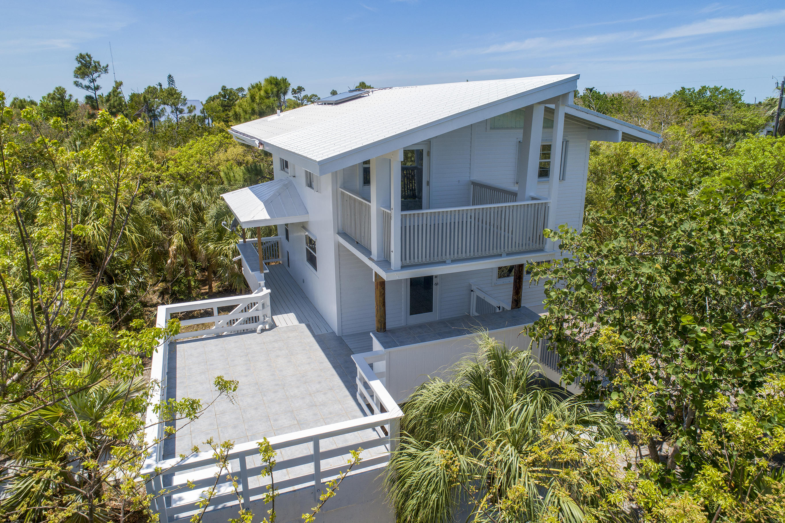 21850 Valencia Road Cudjoe, FL 33042 - Photo 2 of 34 East Side of Home