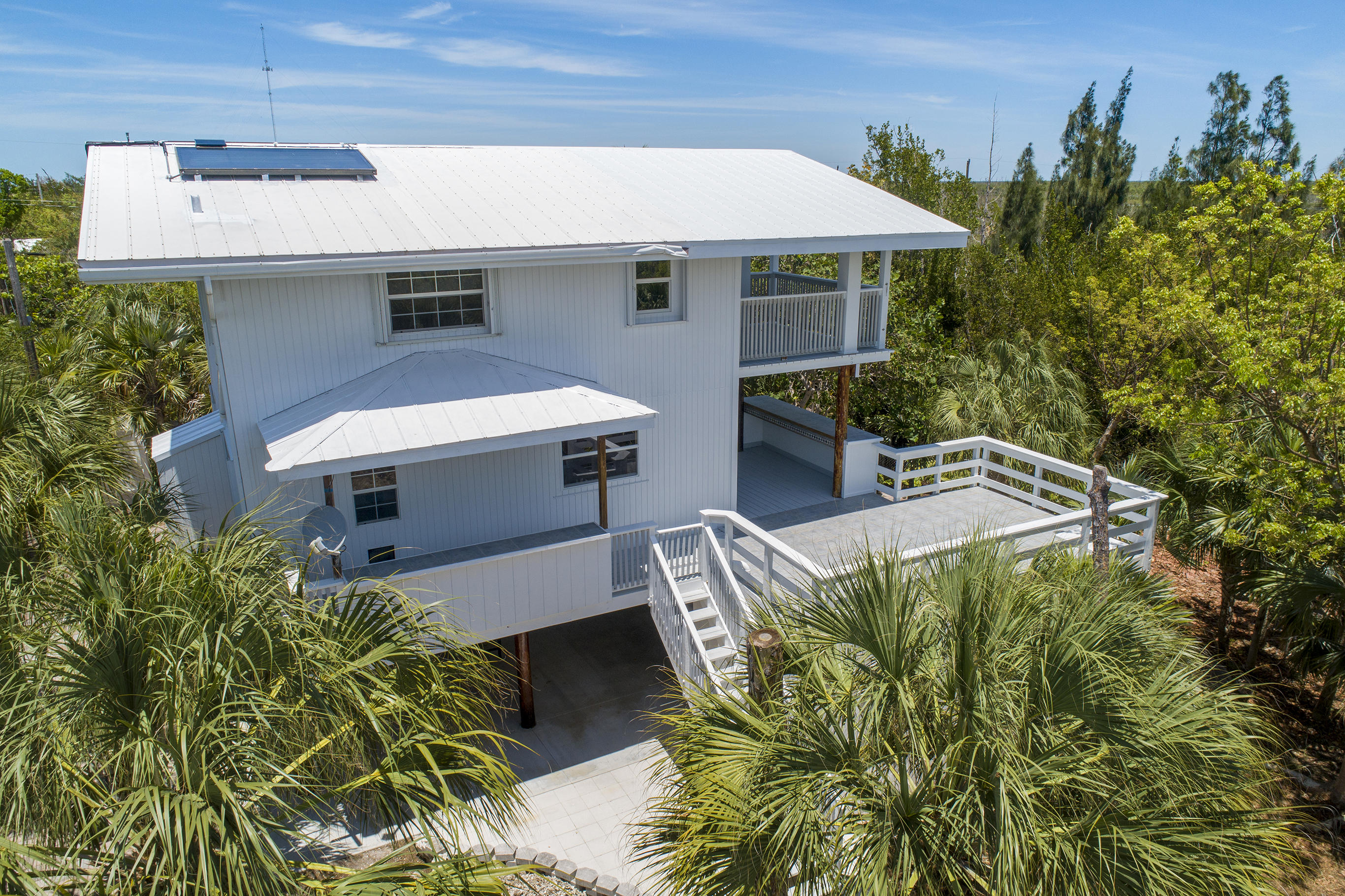 21850 Valencia Road Cudjoe, FL 33042 - Photo 28 of 34 South Side of Home
