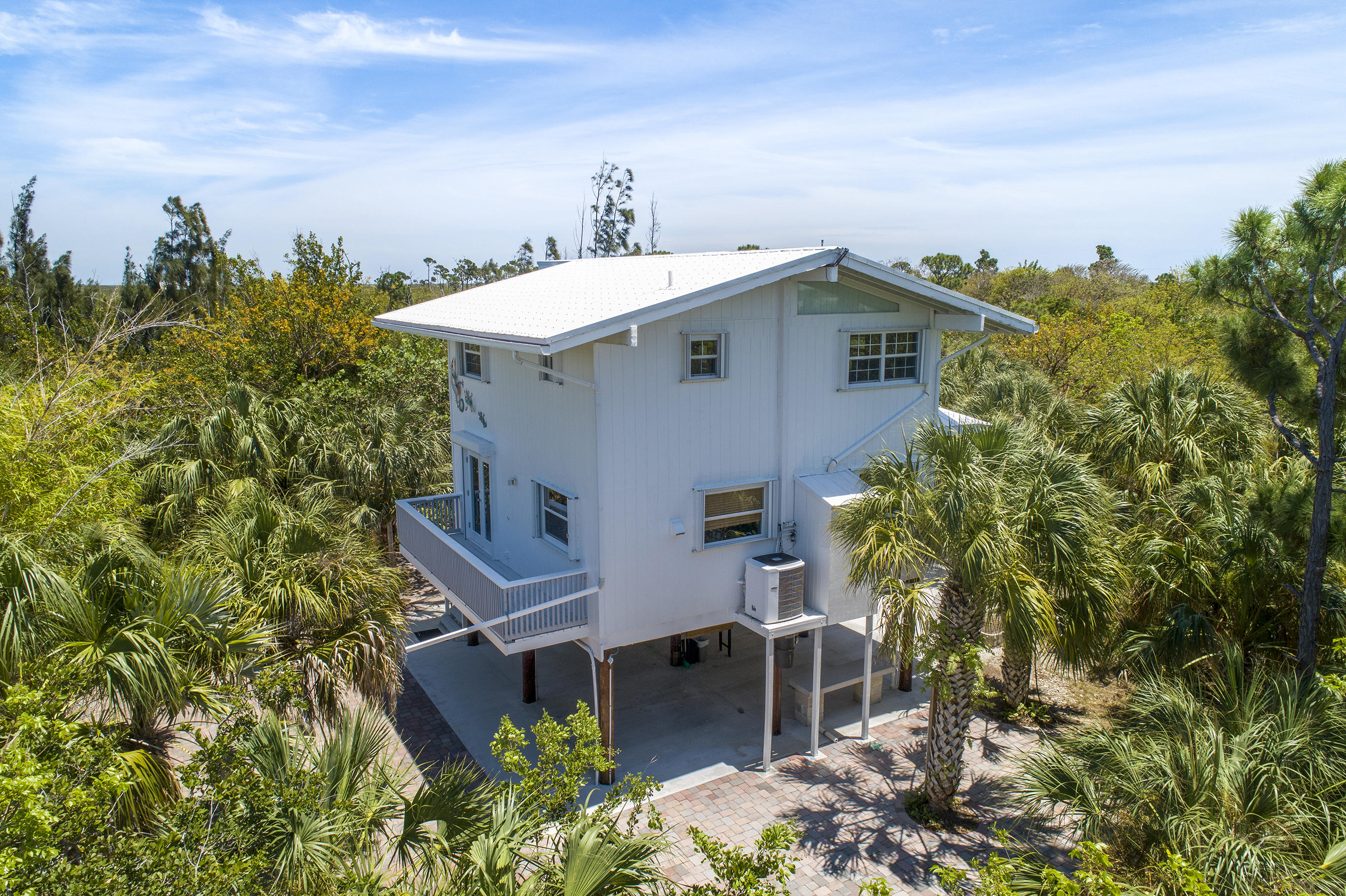 21850 Valencia Road Cudjoe, FL 33042 - Photo 29 of 34 West Side of Home