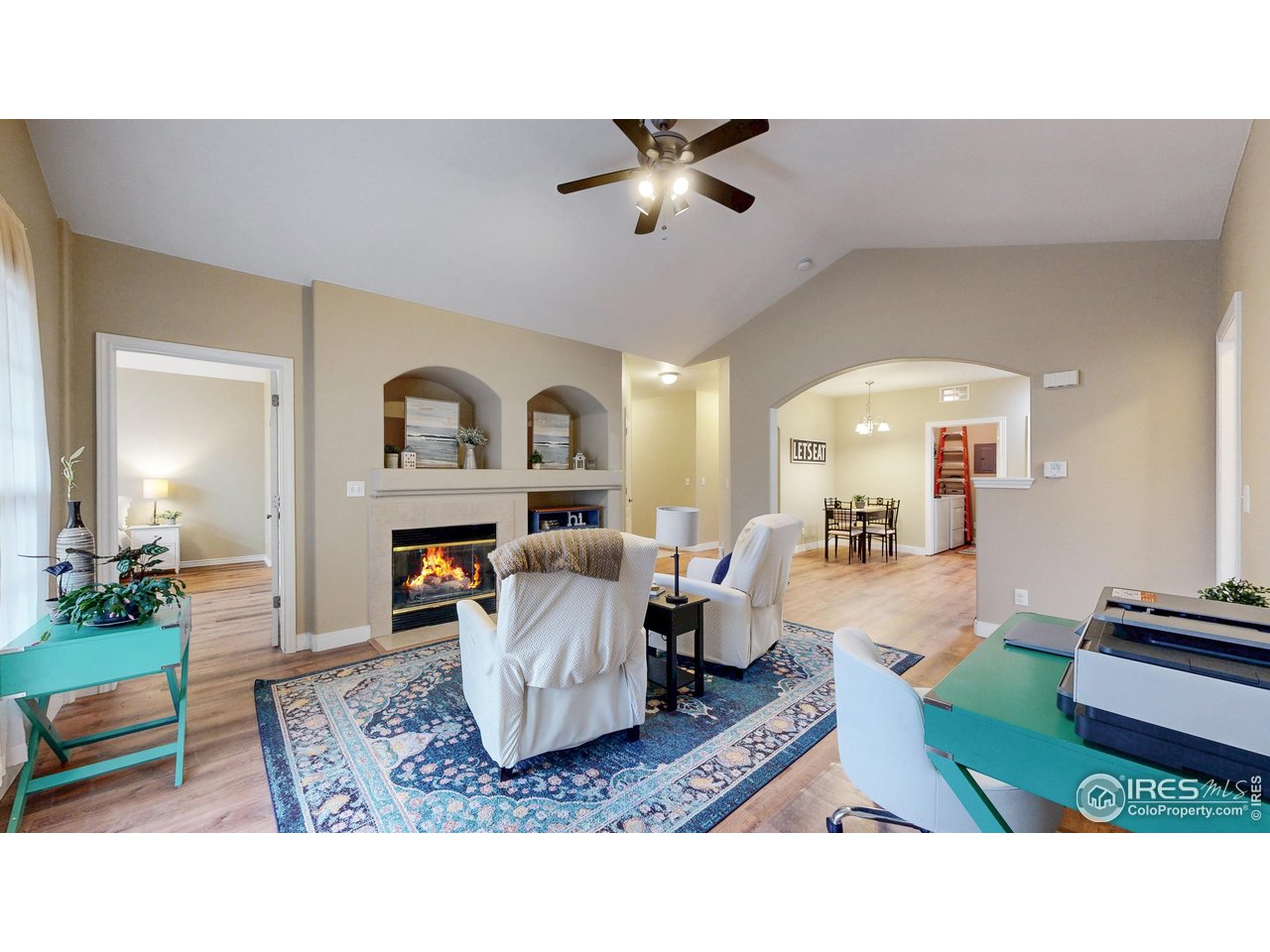 4672 West 20th Road, Unit 1823 Greeley, CO 80634 - Photo 5 of 24 Cozy gas fireplace and vaulted ceilings!