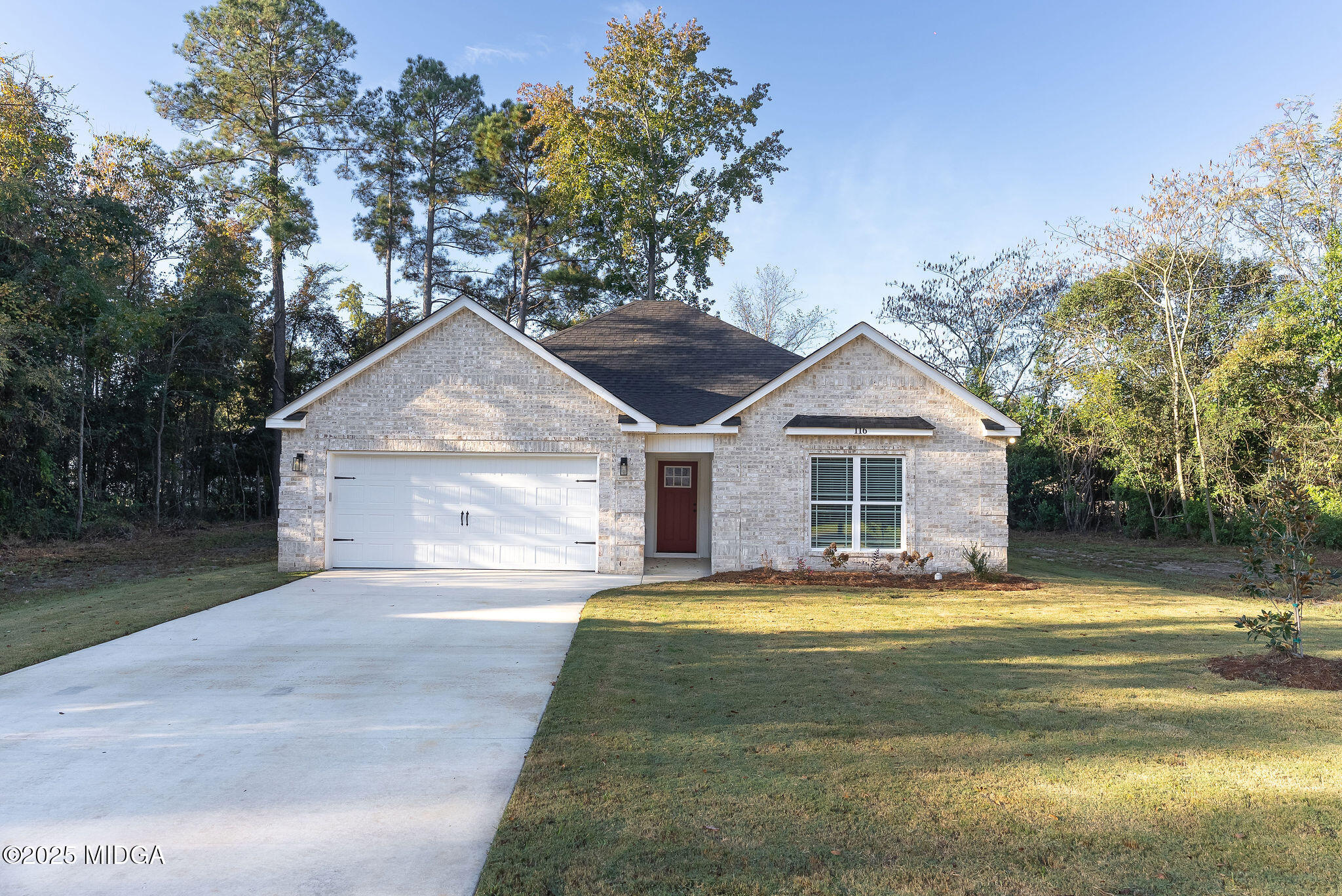 116 Fred Court Macon, GA 31216 - Photo 1 of 27 a view of a house with a yard and large tree