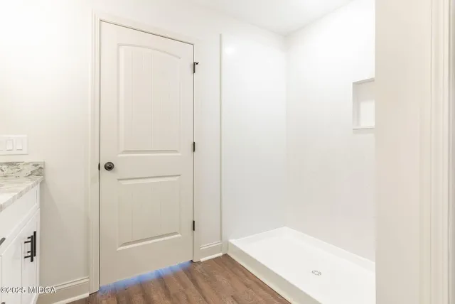 a bathroom with a bathtub