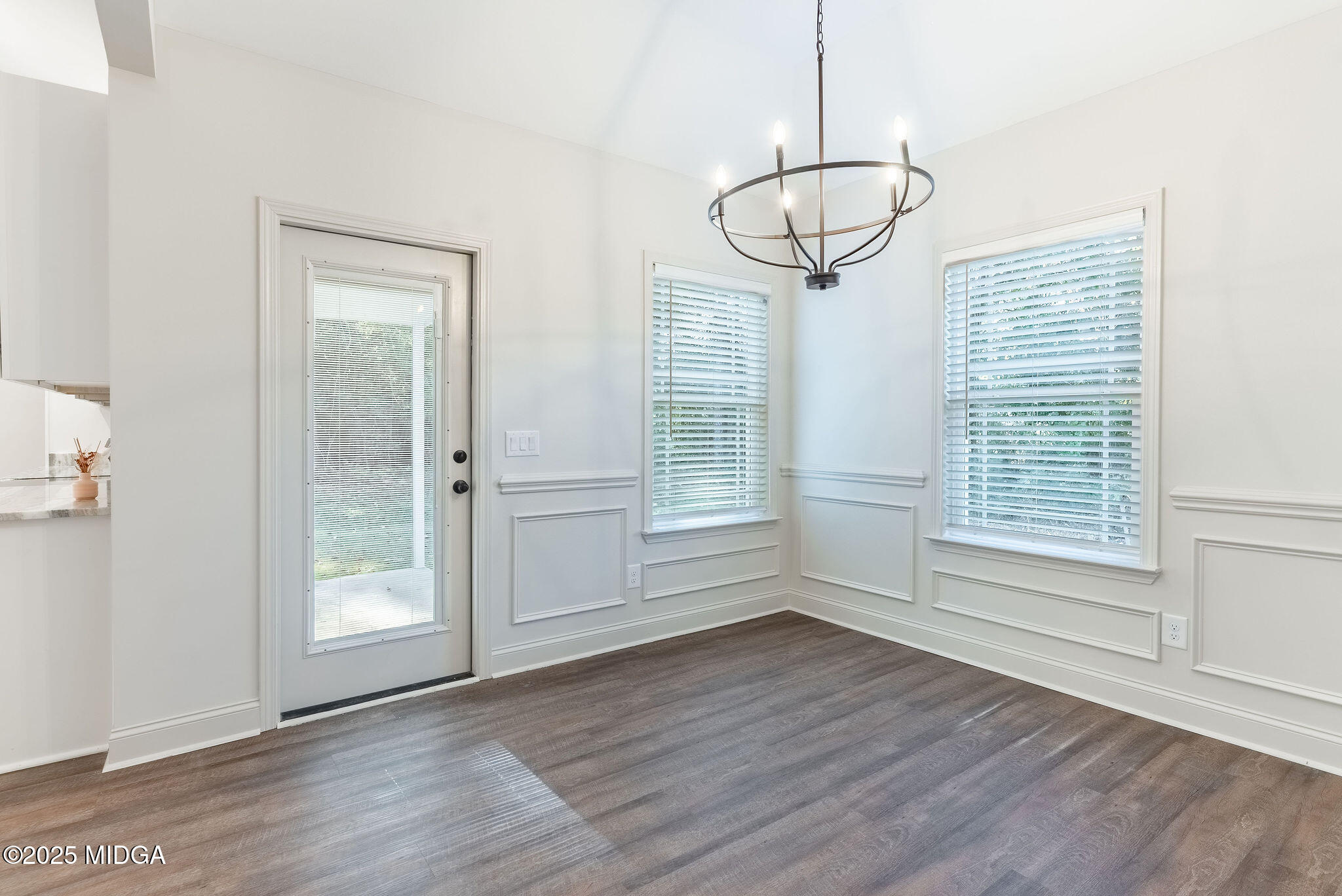 116 Fred Court Macon, GA 31216 - Photo 7 of 27 a view of empty room with wooden floor and fan