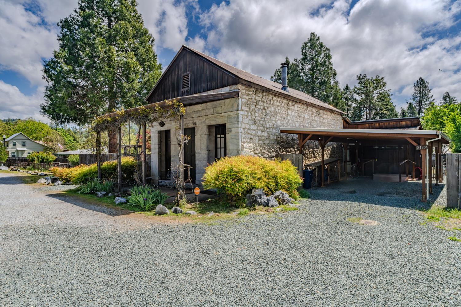 21376 Consolation Street Volcano, CA 95689 - Photo 1 of 70 a front view of a house with garden