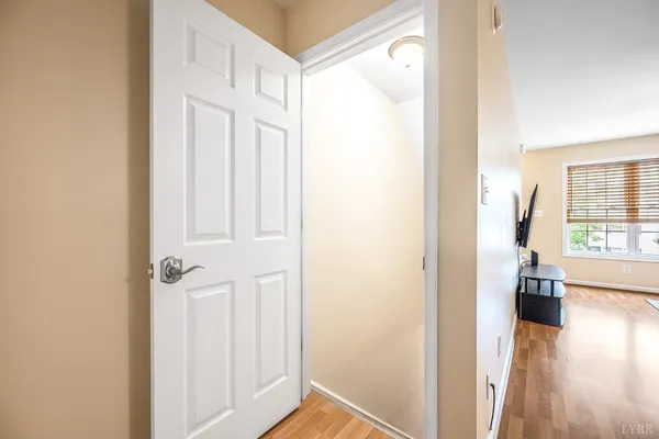 a bedroom with a bed a desk and chair