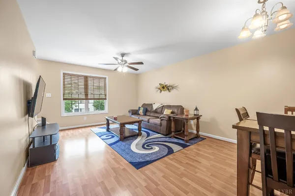 a bedroom with a bed and a chair