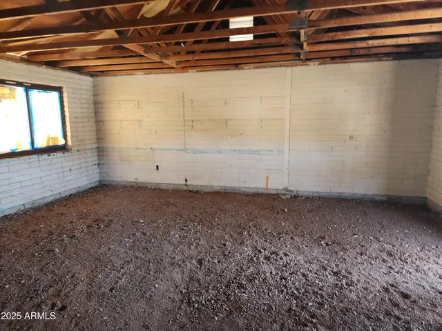a view of an empty room with window