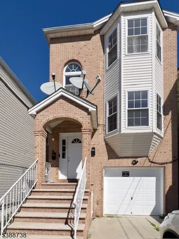 a front view of a house with a balcony