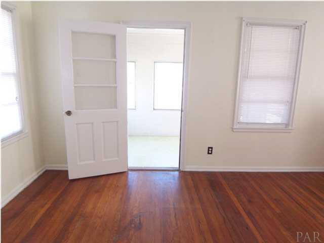 403 Greve Road Pensacola, FL 32507 - Photo 3 of 20 Living room to sunroom