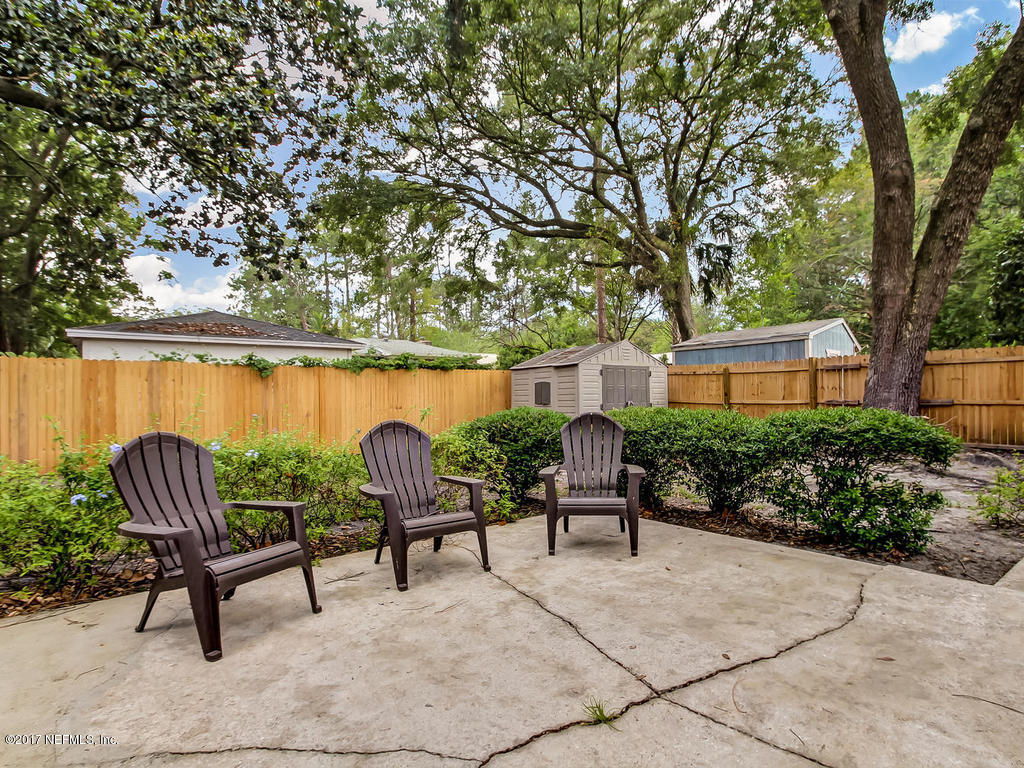 3754 Coronado Road Jacksonville, FL 32217 - Photo 15 of 19 a chairs and a table in a patio