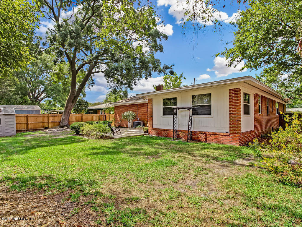 3754 Coronado Road Jacksonville, FL 32217 - Photo 16 of 19 a front view of a house with garden