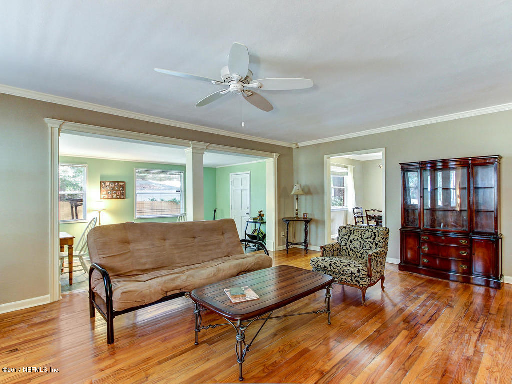 3754 Coronado Road Jacksonville, FL 32217 - Photo 5 of 19 a living room with furniture and wooden floor