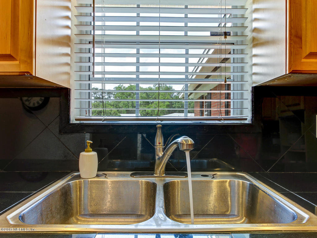 3754 Coronado Road Jacksonville, FL 32217 - Photo 9 of 19 a close view of sink and a window