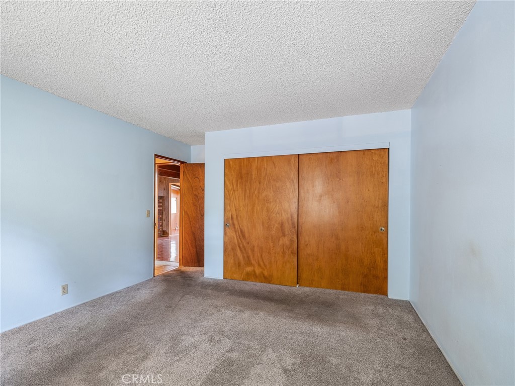 1725 Linnet Road Wrightwood, CA 92397 - Photo 14 of 35 a view of an empty room with a window