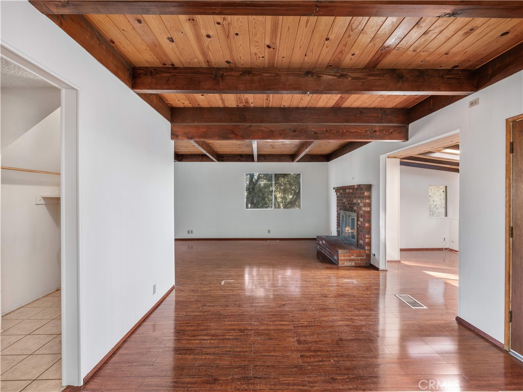 1725 Linnet Road Wrightwood, CA 92397 - Photo 15 of 43 a view of empty room with wooden floor
