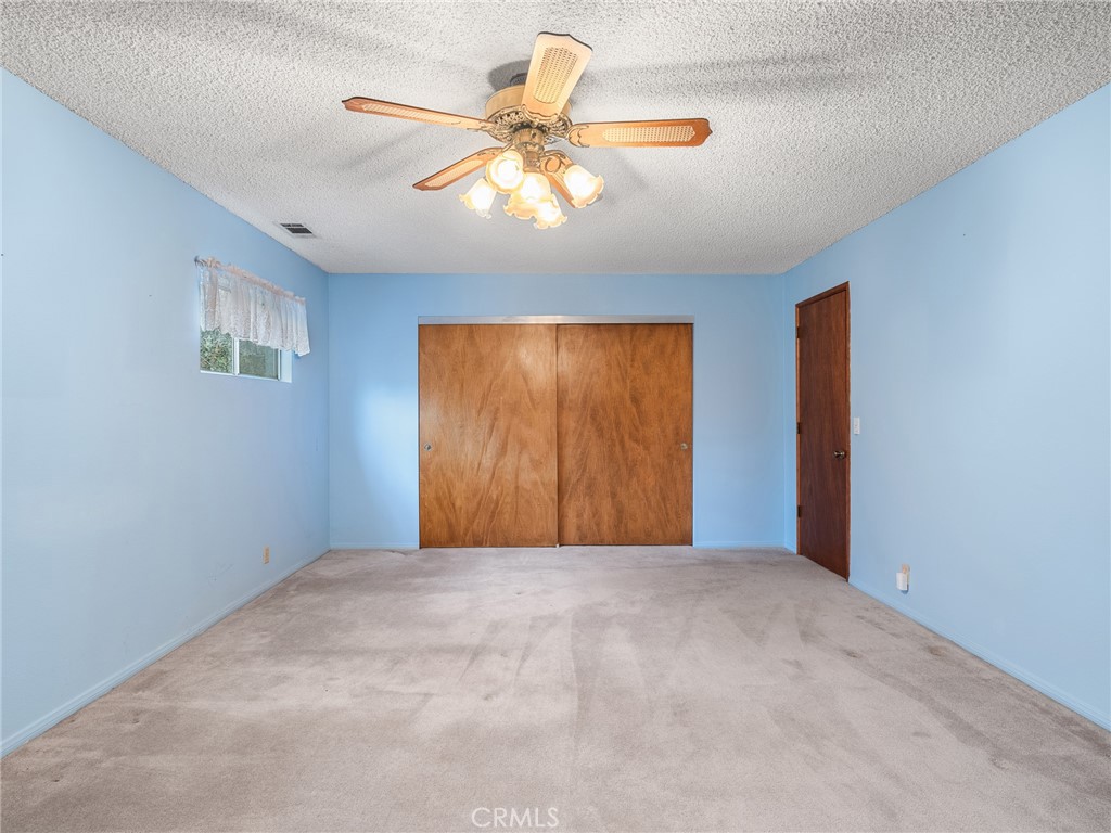 1725 Linnet Road Wrightwood, CA 92397 - Photo 18 of 35 a view of an empty room with a window