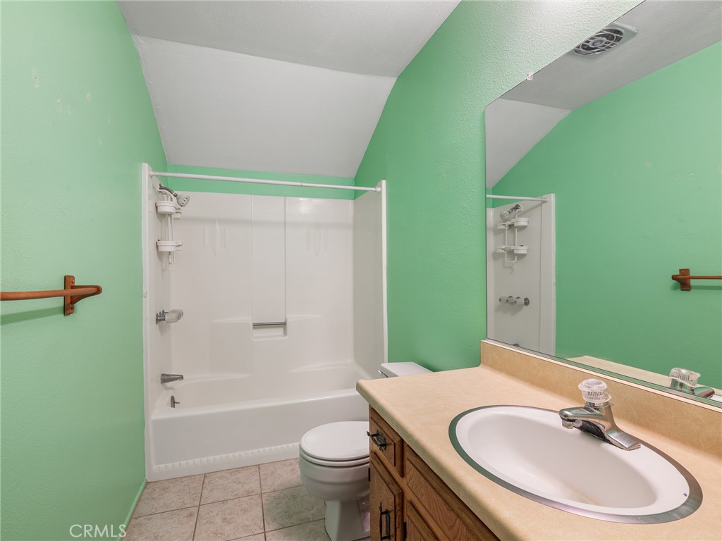 1725 Linnet Road Wrightwood, CA 92397 - Photo 20 of 35 a bathroom with a sink and a mirror