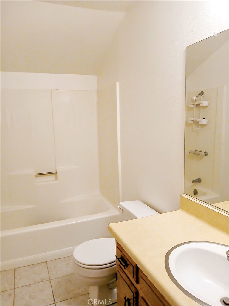 1725 Linnet Road Wrightwood, CA 92397 - Photo 28 of 43 a bathroom with a sink a toilet and shower