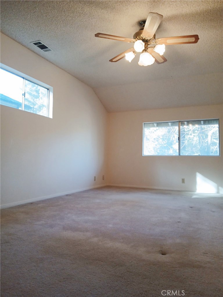 1725 Linnet Road Wrightwood, CA 92397 - Photo 29 of 43 a view of an empty room with a window