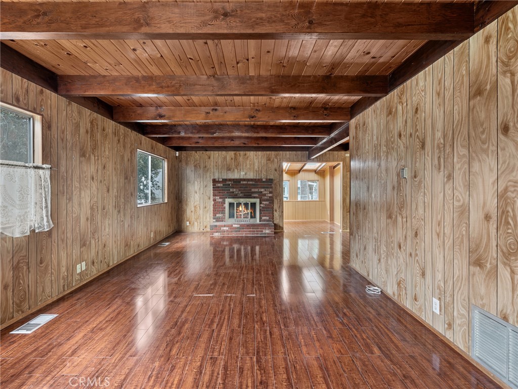 1725 Linnet Road Wrightwood, CA 92397 - Photo 3 of 35 a view of empty room with wooden floor