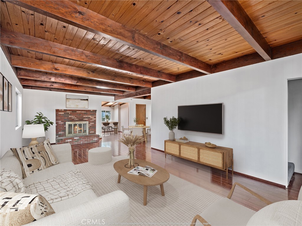 1725 Linnet Road Wrightwood, CA 92397 - Photo 3 of 43 a living room with furniture and a flat screen tv