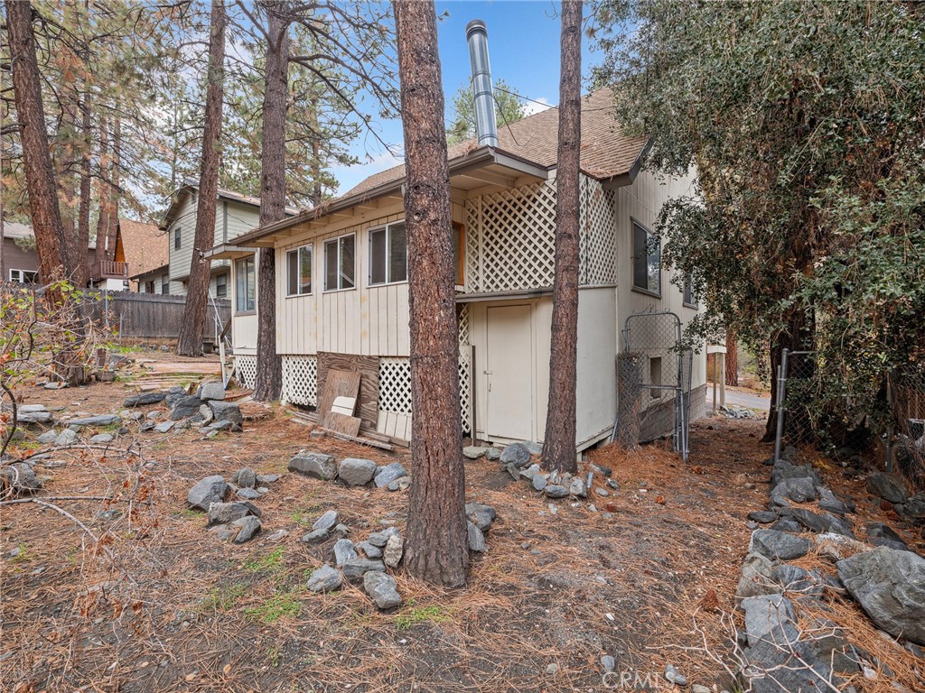 1725 Linnet Road Wrightwood, CA 92397 - Photo 36 of 43 a view of a house with a yard covered in snow