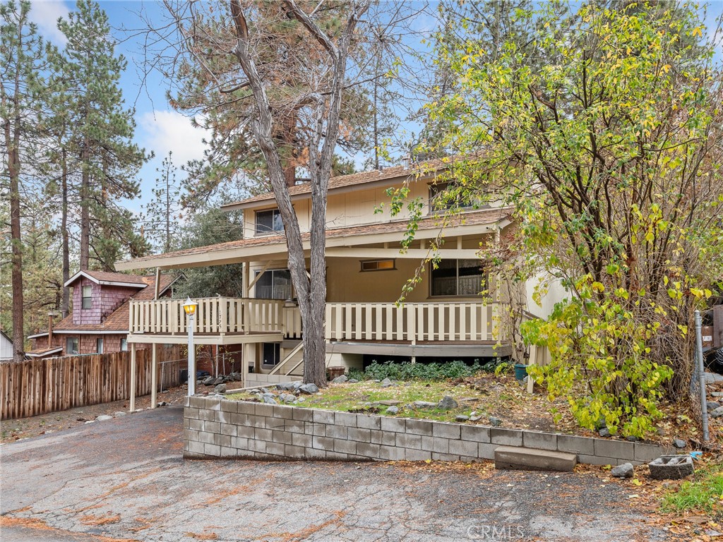 1725 Linnet Road Wrightwood, CA 92397 - Photo 39 of 43 front view of a house with a yard