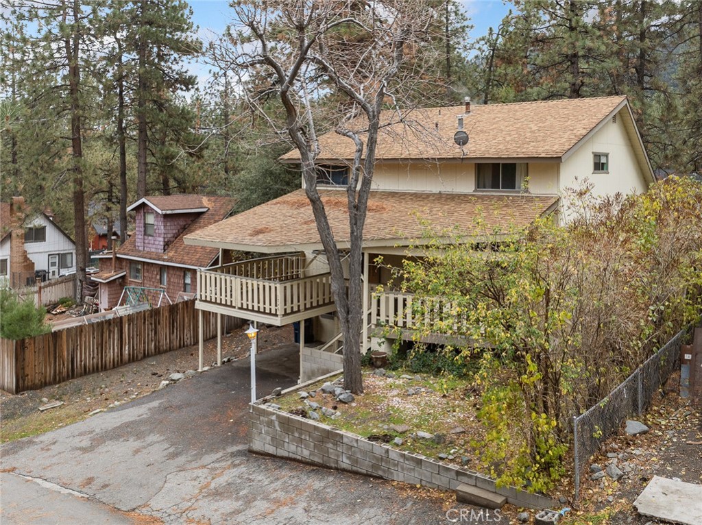 1725 Linnet Road Wrightwood, CA 92397 - Photo 40 of 43 a white house that has tree in front of it