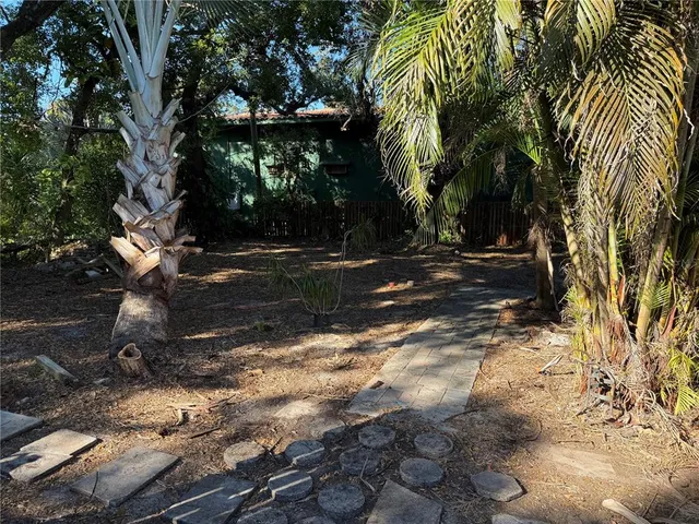 a view of backyard with green space