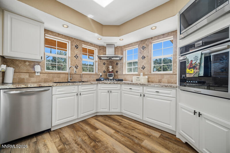 1931 Lousetown Road Reno, NV 89521 - Photo 10 of 51 a kitchen with cabinets appliances and a sink