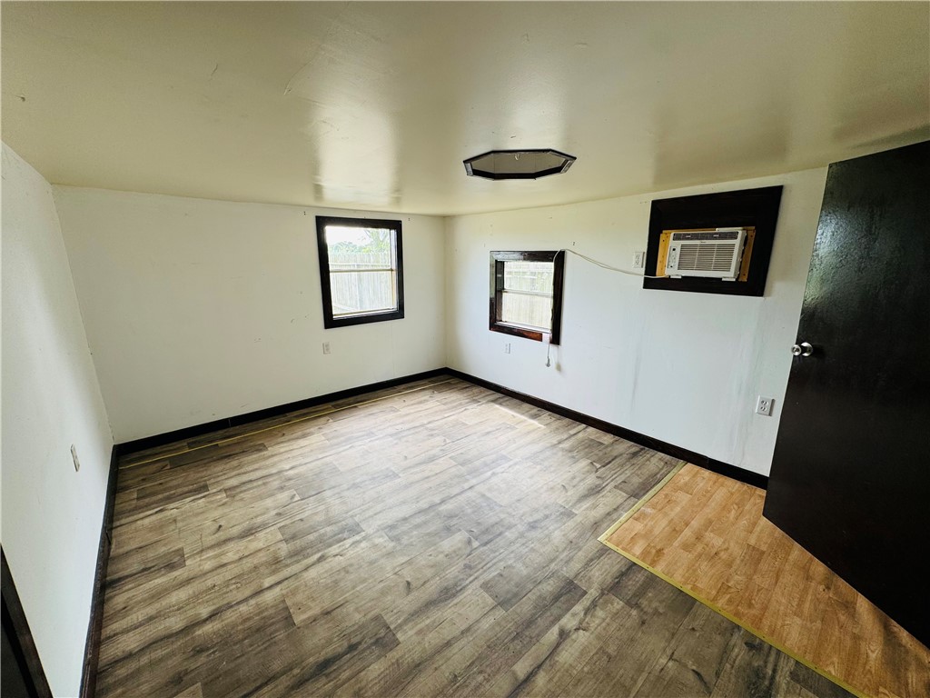 713 Jane Street Corpus Christi, TX 78418 - Photo 11 of 18 a view of an empty room with a window